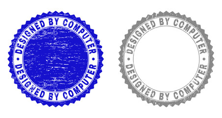 Grunge DESIGNED BY COMPUTER stamp seals isolated on a white background. Rosette seals with grunge texture in blue and gray colors.