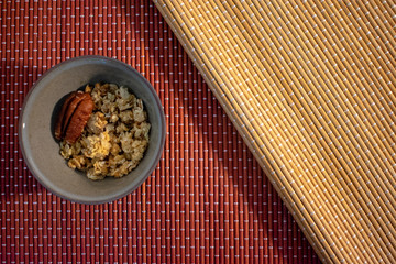 Healthy food, granola bowl with pattern background and copy space 