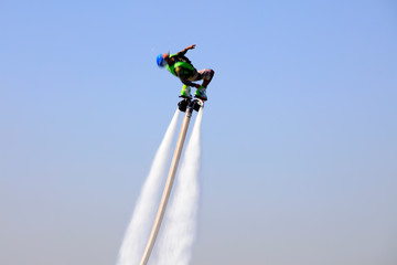 Water stunts performance in a park