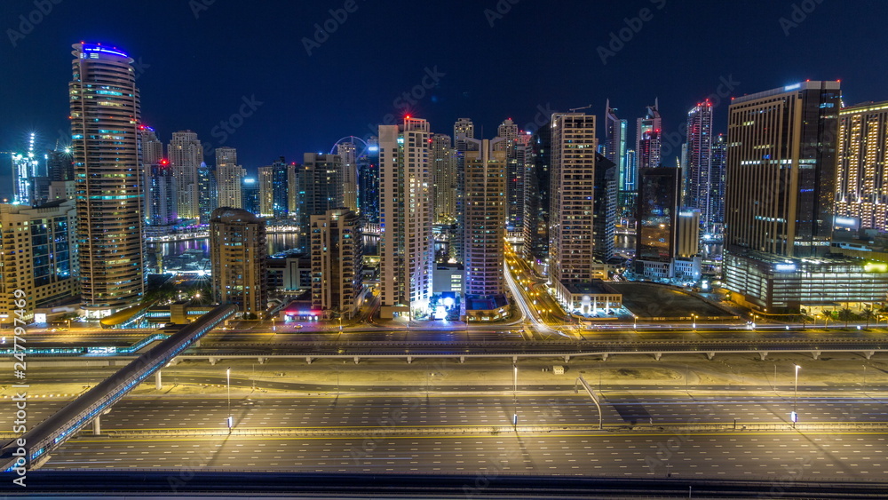 Wall mural fantastic rooftop skyline of dubai marina timelapse.