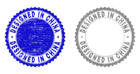 Grunge DESIGNED IN CHINA stamp seals isolated on a white background. Rosette seals with grunge texture in blue and gray colors.