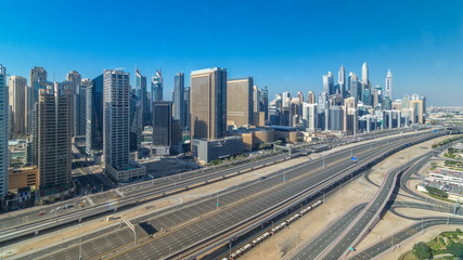 Fototapeta na wymiar Dubai Marina skyscrapers aerial top view during all day from JLT in Dubai timelapse, UAE.