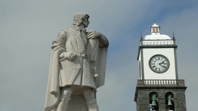 Statue of Goncalo Velho Cabral and the Cathedral clock tower, Ponta Delgada, San Miguel island, Azores