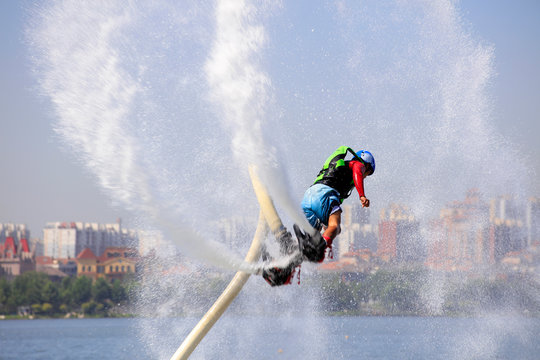 Water stunts performance in a park