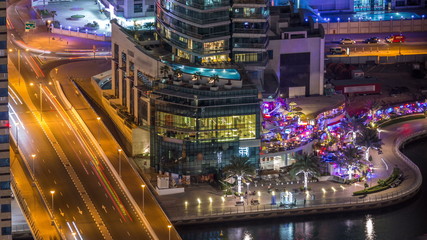 Fototapeta na wymiar Luxury Dubai Marina canal and promenade night timelapse, Dubai, United Arab Emirates