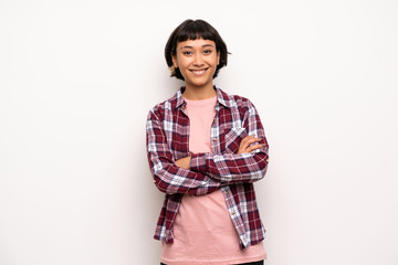 Fototapeta premium Young woman with short hair keeping the arms crossed in frontal position