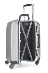 Open travel bag isolated on white background