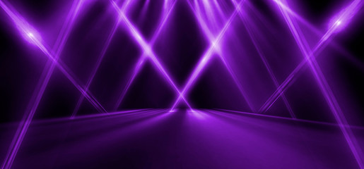 Empty stage background in purple color, spotlights, neon rays. Abstract background of neon lines and rays.