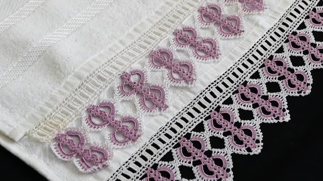 white Turkish towels, hand towels, wonderful towel types embroidered on black background,