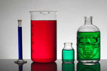 Liquid in laboratory bottles. Scientific biochemical laboratory. Colorful liquid.