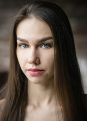 Obraz premium Portrait of beautiful young woman with blue eyes.