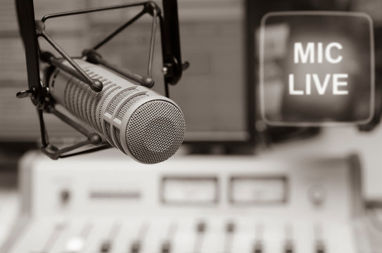 Professional microphone in radio studio on air