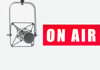 Professional microphone in radio studio on air