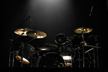 Drums on stage with spotlights