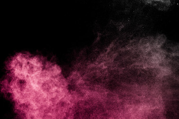 red powder effect splash for makeup artist or graphic design in black background