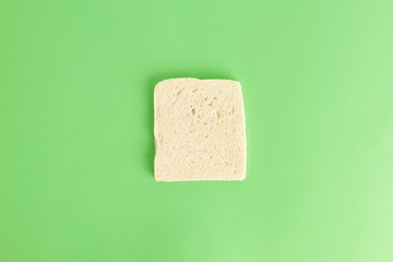 bread without rind in colorful background..