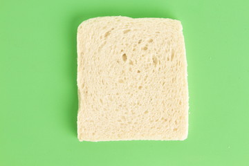 bread without rind in colorful background..