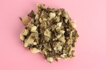 delicious chard with potato on pink background