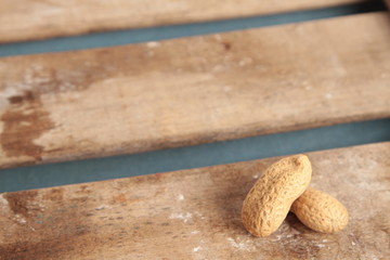 peanuts on wooden background