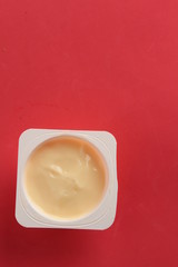 custard packed in plastic container