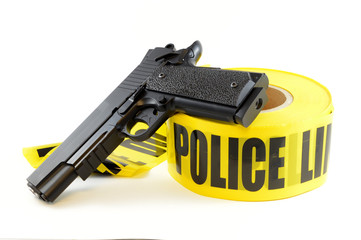 Police Tape and Gun