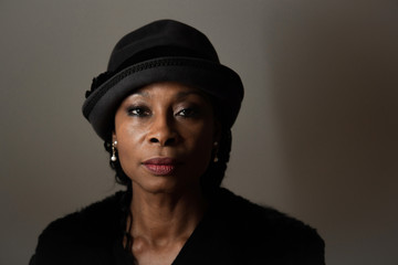 Close up of mature woman wearing hat