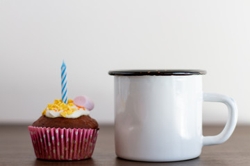 cupcake with iron white mug