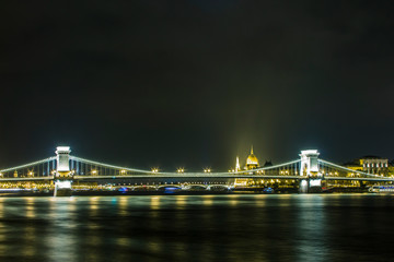Fototapeta na wymiar A night view of the Danube River and bridges in Budapest. Hungary