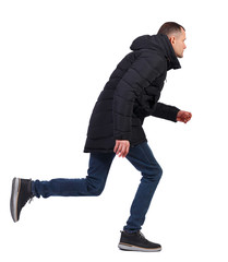 Side view of a running man in winter jacket.