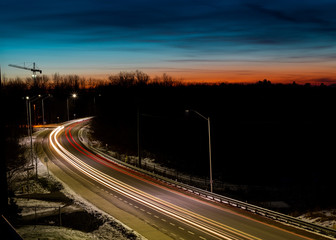 Fototapeta na wymiar Long exposure shot of cars during rush hour at dusk