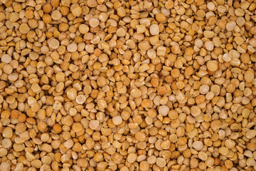 Dry yellow split peas background texture