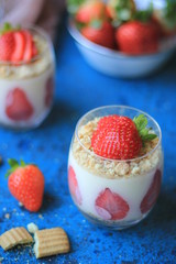 Cream dessert in glass  with strawberries