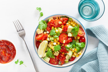 healthy vegan avocado sweetcorn tomato salad