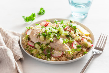 chicken breast with couscous, cucumber, avocado, spring onion, radish. healthy lunch