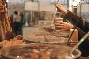 Close-up of mulled wine at the street food market.