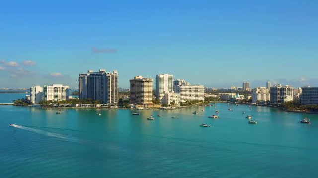 Aerial stock video Miami Beach waterfront condominiums 4k 24p