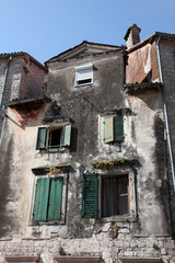 Mediterranean house with shutters and flowers in Kotor, Montenegro