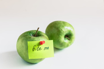 two apples on white background, note 