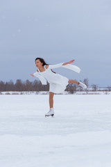 Pretty young woman on skates