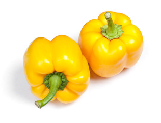 Two sweet yellow bell peppers