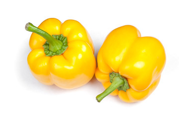 Two sweet yellow bell peppers