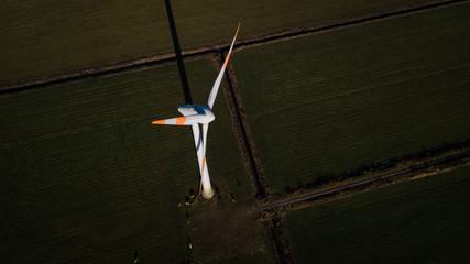 Wind Turbines sit on rolling hills. Wind turbine field generate of electrical