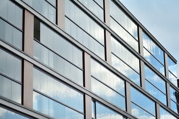 Abstract fragment of contemporary architecture, walls made of glass and concrete.