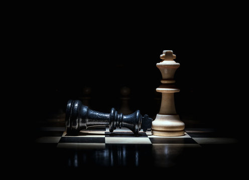 Download Caption: Majestic Golden Chess King On A Chessboard Wallpaper |  Wallpapers.com