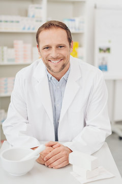 Attractive friendly young male pharmacist