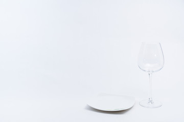 Alcoholic drinks such as wine or beer and variable colorful side dish such as vegetables or fruites surrounded clean white wall for the celebration of anniversary day.