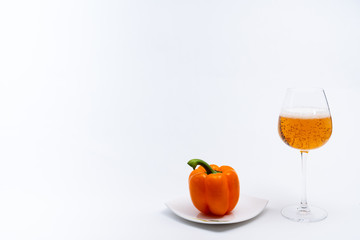Alcoholic drinks such as wine or beer and variable colorful side dish such as vegetables or fruites surrounded clean white wall for the celebration of anniversary day.