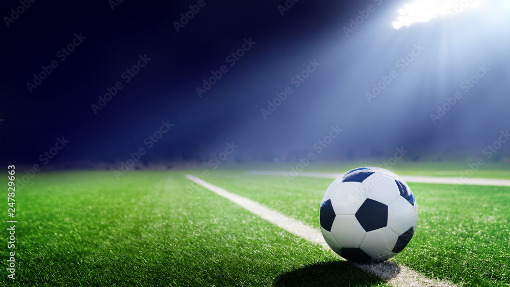 Canvas Prints tradition soccer ball illuminated by stadium lights