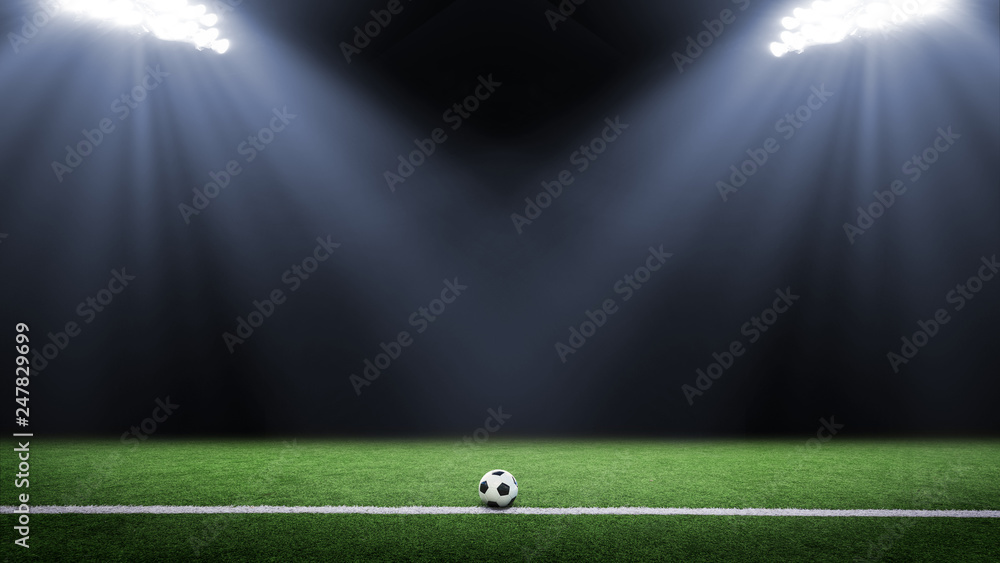 Wall mural tradition soccer ball illuminated by stadium lights