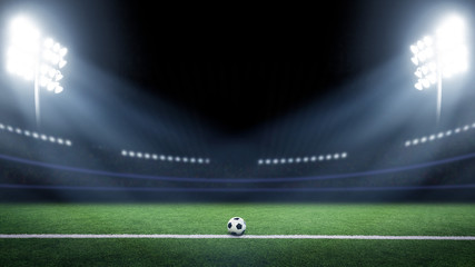Tradition soccer ball illuminated by stadium lights